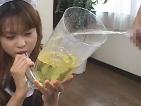 Japanese Maid Drinks Piss from a Directely Filled Funnel